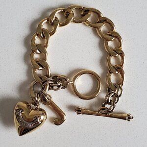 Juicy Couture Toggle Bracelet goldtone with heart charm and "J" logo charm